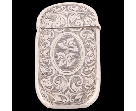 A Victorian silver Vesta case, Colen Hewer Cheshire, Birmingham 1877, oval form with allover foliate engraved decoration, 5cm