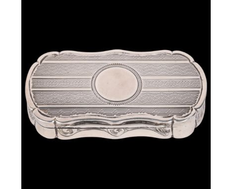 A Victorian silver vinaigrette, Robert Thornton, Birmingham 1871, shaped oval form with engine turned decoration and chased f