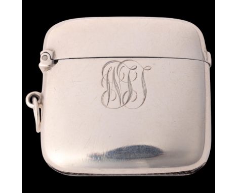 A George V silver Vesta case, Colen Hewer Cheshire, Chester 1918, curved plain rectangular form with gilt interior, 4.5cm x 4