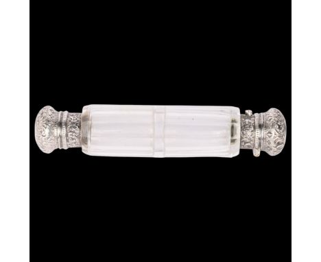 A Victorian silver-mounted glass double-ended scent bottle, George Brace, London 1885, the faceted glass body with relief emb