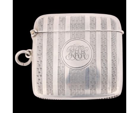 A George V silver Vesta case, TH Hazlewood & Co, Birmingham 1911, curved rectangular form with allover engine turned decorati