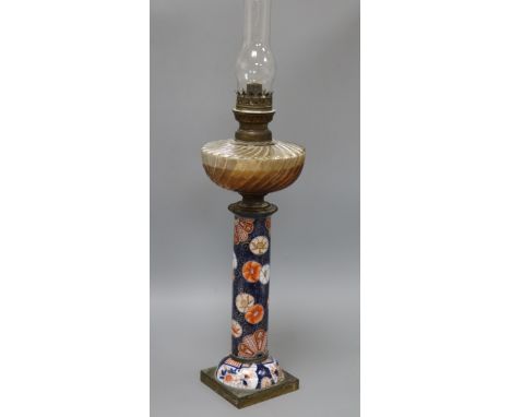 An Imari based oil lamp height 74cm incl. shade