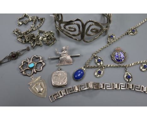 A collection of mainly silver jewellery and a pierced white metal bangle.