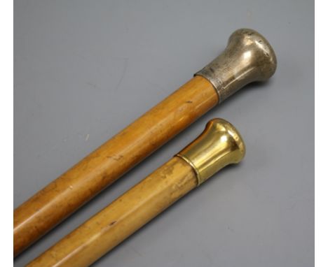 An 18ct gold topped walking stick and a silver topped walking stick