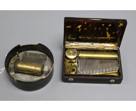 A 19th century tortoiseshell pocket musical box and a 'Carisbrooke Castle' musical box, the first of rectangular form, initia