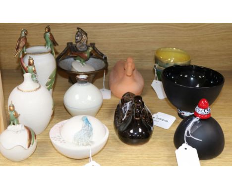 A collection of small studio glass and pottery items, including a black, red and white glass perfume bottle and stopper by Pa