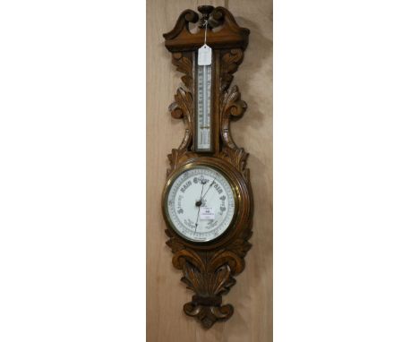 An Edwardian oak banjo barometer W.25cm