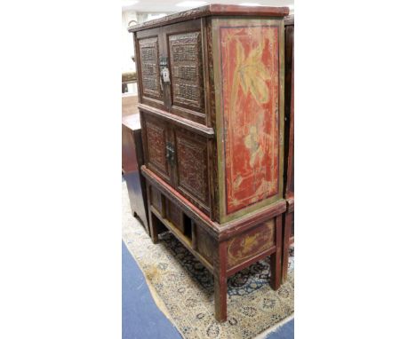 A 19th century Chinese carved and lacquered wood cabinet on stand W.104cm