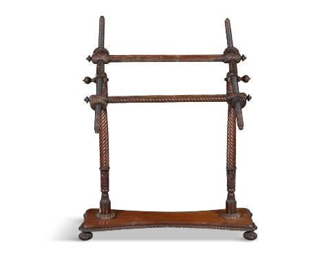 A ROSEWOOD LADY'S TAPESTRY STRETCHER,with articulated and adjustable frame and threaded timer uprights, on waisted oblong bas