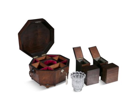 A REGENCY ROSEWOOD OCTAGONAL TEA CADDY,the domed hinged top opening to a red felt lined compartmented base, with four hinged 
