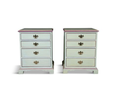 A PAIR OF POLYCHROME-DECORATED BEDSIDE CABINETS, MODERN, each with four graduated drawers on bracket feet, 76cm high, 61cm wi