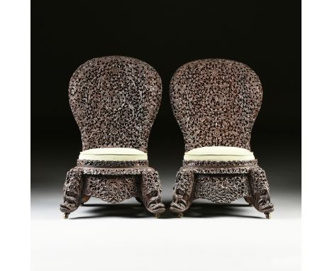 A PAIR OF ANGLO INDIAN "BOMBAY BLACKWOOD" FILIGREE SLIPPER CHAIRS, 1850-1890, the pierced rosewood backs centering a lion bea