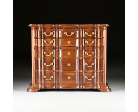 A CUSTOM BAROQUE STYLE CARVED MAHOGANY CHEST OF DRAWERS, MODERN, the undulating rectangular top above a conforming front of t