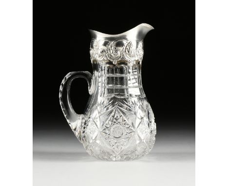 AN AMERICAN BRILLIANT PERIOD STERLING SILVER MOUNTED CUT CRYSTAL PITCHER, MARKED, NEW YORK, 1890-1915, with a cylindrical sca