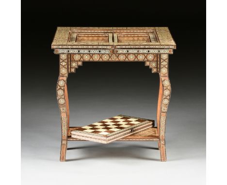 A MIDDLE EASTERN SYRIAN PARQUETRY INLAID GAMES TABLE, 20TH CENTURY, with intricately inlaid bone, mother-of-pearl, olive, and