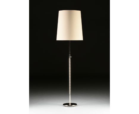 A CONTEMPORARY POLISHED CHROME FLOOR LAMP, MODERN, with a cylindrical rod form standard centering double and single line deta