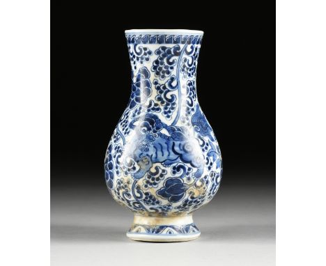 A CHINESE BLUE AND WHITE BUDDHISTIC LION PAINTED VASE, SHIPWRECK ARTIFACT, MARKED, POSSIBLY KANGXI PERIOD, 1662-1722, of pear