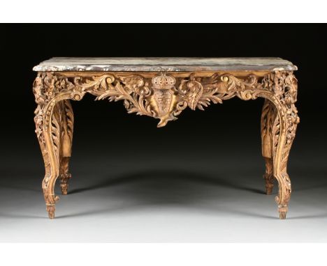 A LOUIS XV STYLE MARBLE TOPPED GILTWOOD TABLE DE MILIEU, POSSIBLY ITALIAN, CIRCA 1880, the serpentine rectangular BrÃ¨che Vio