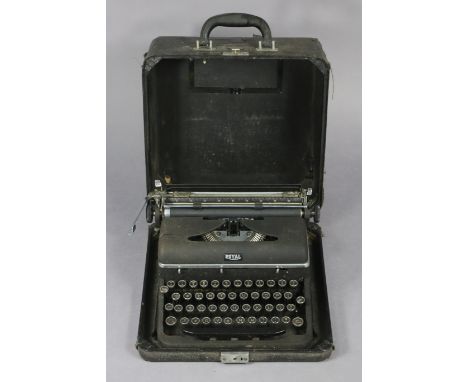 A vintage “Royal” typewriter in fibre-covered travelling case, 13” wide x 16.5” high.