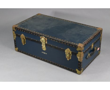 A vintage fibre-covered travelling trunk with metal mounts &amp; locks; 36” wide x 14.5” high x 20” deep.