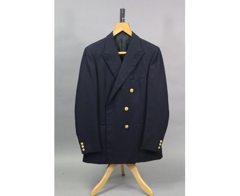 A navy blue blazer jacket with brass buttons, tailored by H. Huntsman &amp; Sons Ltd. of Saville Row, 3.10.1987; approx. meas