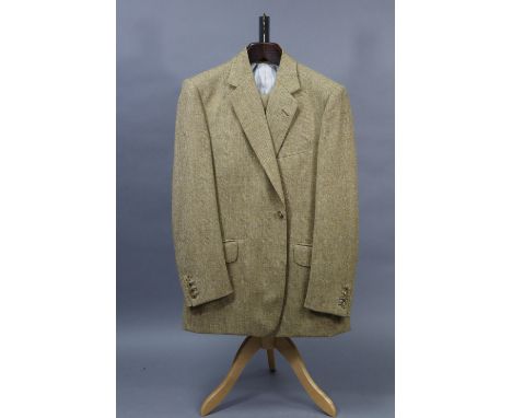 A fawn coloured suit jacket with matching waistcoat and trousers, tailored by Hunstman &amp; Son Ltd. of Saville Row, 15.10.2