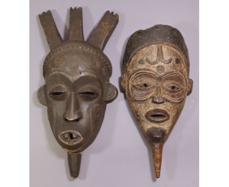 A tribal mask, possible Biombo, the head with three carved crests, 16"; &amp; another, possibly Lulua, with carved decoration