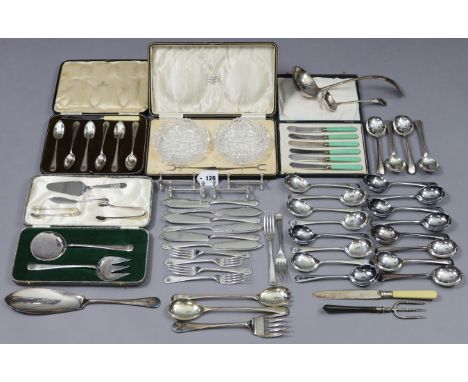 A pair of silver-plated Old English pattern fish servers, six pairs ditto fish eaters, ditto soup ladle, twenty ditto soup sp