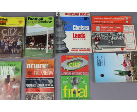 Thirty-eight various football programmes, circa 1968 onwards; &amp; thirty issues of “Football League Review” journal.