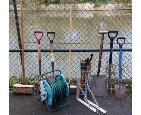 A Powerbase electric lawn mower; together with various garden tools.