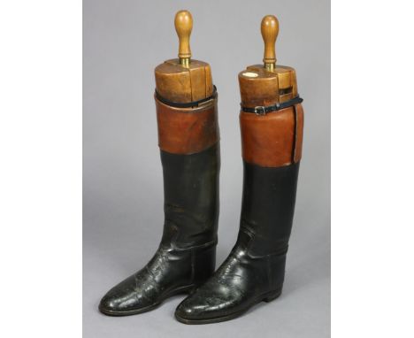 A pair of vintage black leather riding boots (size 7.5), with treen trees, bears label “Rowell &amp; Sons Melton Mowbray”.