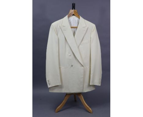 A cream coloured suite jacket tailored by H. Huntsman &amp; Sons Ltd. of Saville Row, 21.03.1989; approx. measurements: Chest