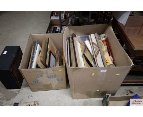 Two boxes of various pictures and prints etc