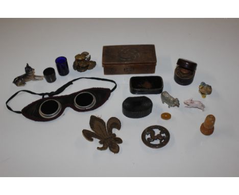 A box containing brass buttons, snuff boxes, goggles, ink well etc.