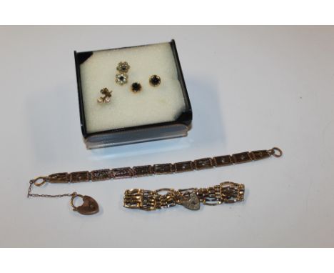 A 9ct gold gate link bracelet with padlock clasp, approx. 7.5gms; another 9ct gold bracelet with padlock clasp, 16gms; and th