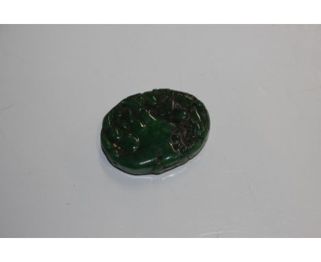 A jade coloured amulet
