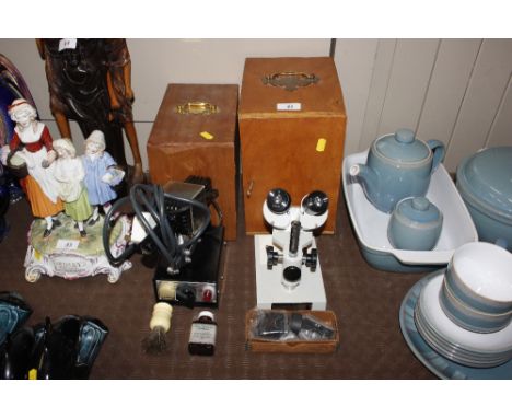 A Hampshire microscope and light both with fitted cases 