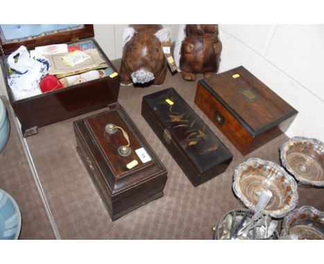 A lacquered trinket box; a work box with key; and a sarcophagus shaped caddy 
