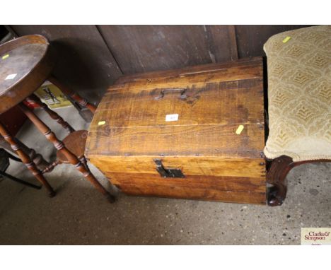 A dome topped trunk and contents of various material 