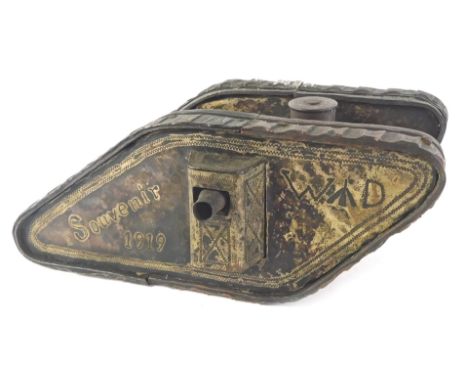 A WWI prisoner of war brass, copper and plated model of a tank, engraved to the side 283 POW COY,EPEHY, the reverse engraved 