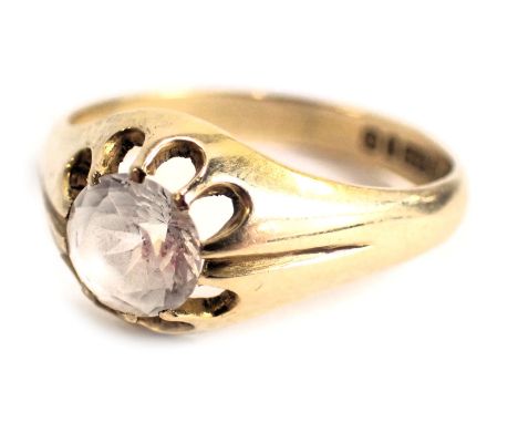 A 9ct gold dress ring, set with white paste stone, in eight claw setting with petalated border, on a plain band, ring size T,