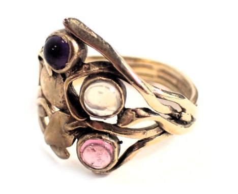 A 9ct gold dress ring, of crossover vine design set with ruby, moonstone and amethyst, ring size N½, 3.4g all in. 