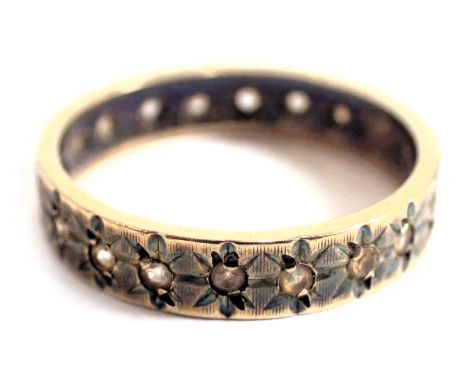 A 9ct gold eternity ring, of star set design, set with CZ stones, ring size N½, discoloured, 2.6g all in. 