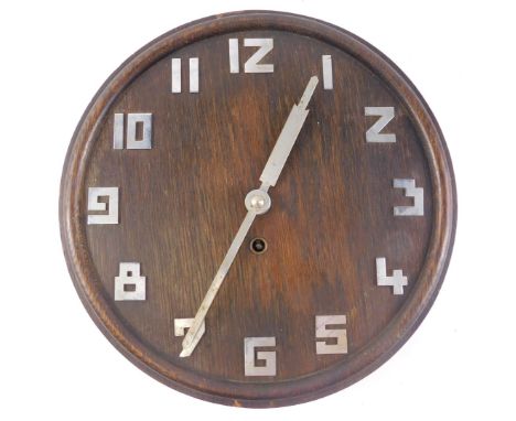 An Art Deco oak wall clock, with chrome plated numerals, 30cm diameter. 