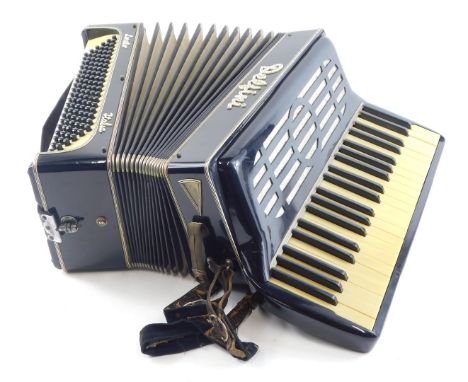 A Delfini piano accordion, by Loreto Italy, in carrying case. 