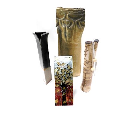 Four items of studio pottery, comprising a tall stemmed vase, unsigned, Art Glass tree of life mantel clock, and two other po