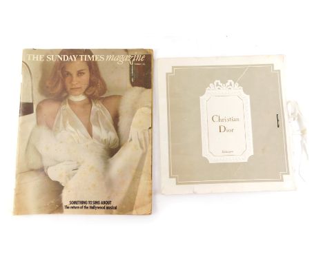 A Christian Dior black silk scarf with original packaging, and a copy of The Sunday Times magazine for 1974.