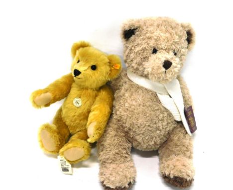 A Steiff Classic Original Teddy bear, for 1909, with label and tag, and a Playful Pals Teddy bear with passport. (2) 