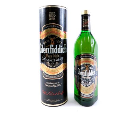 A Glenfiddich Single Malt Scotch Whisky, 1ltr bottle in cardboard tube. 