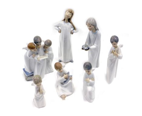 A collection of Nao figures of angels, Lladro figure of a girl, etc. (7) 